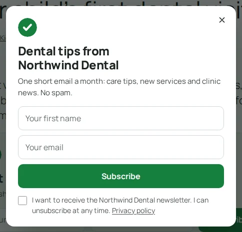 A newsletter popup as a visitor sees it, with the consent checkbox and the attribution line under it.